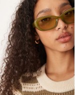 oval sunglasses in pale green